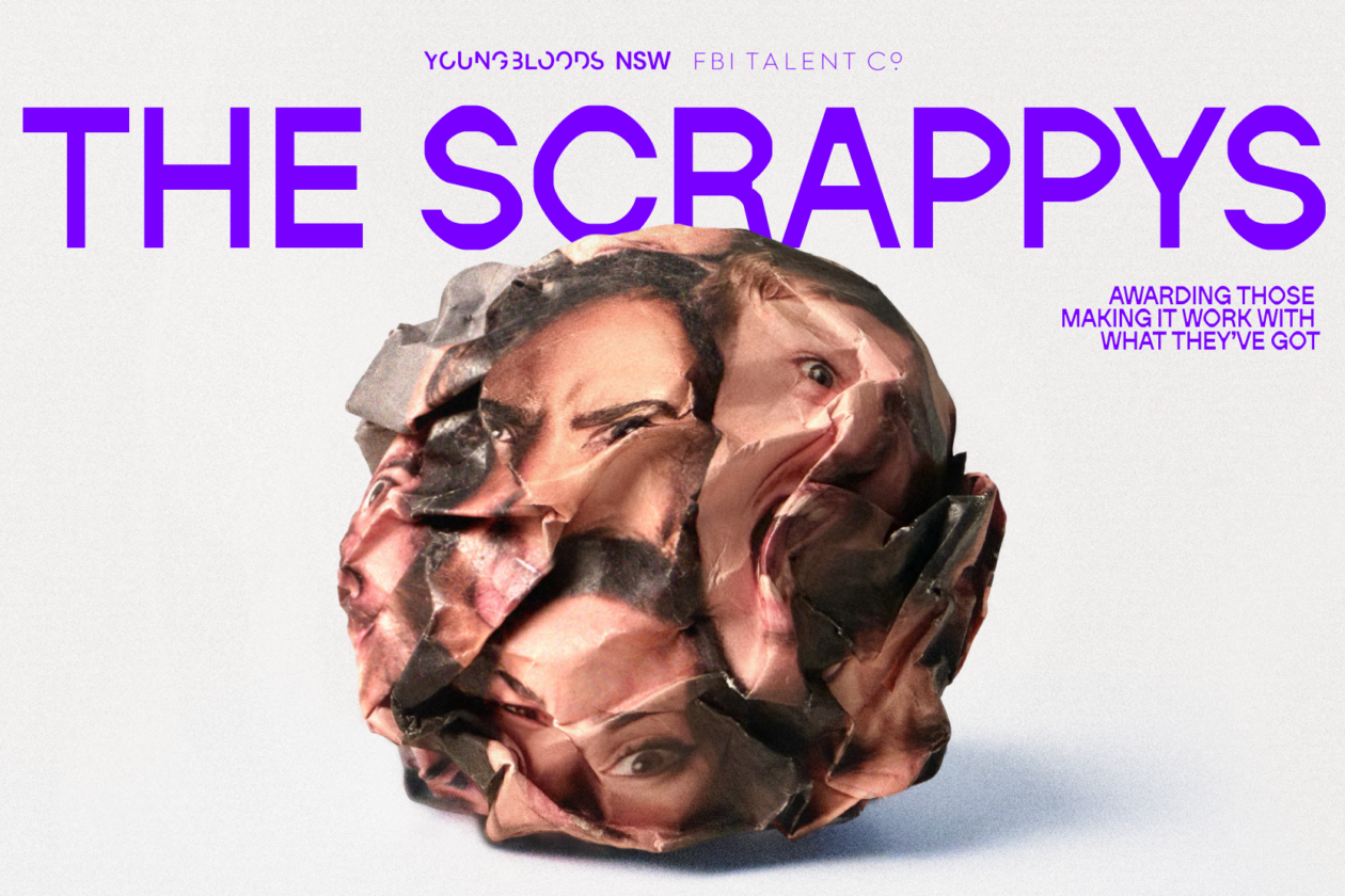 a scrunched ball of paper with faces on it looking distorted and emotional, on a plain grey background